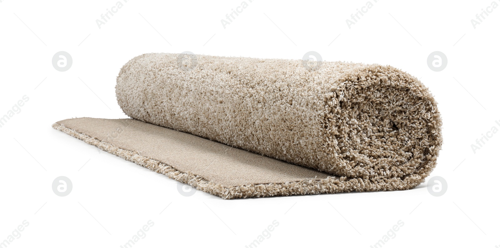 Photo of Rolled fuzzy carpet on white background. Interior element