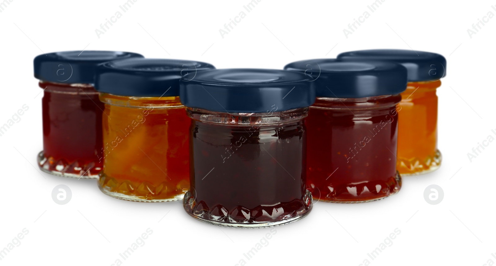 Photo of Jars with different jams on white background