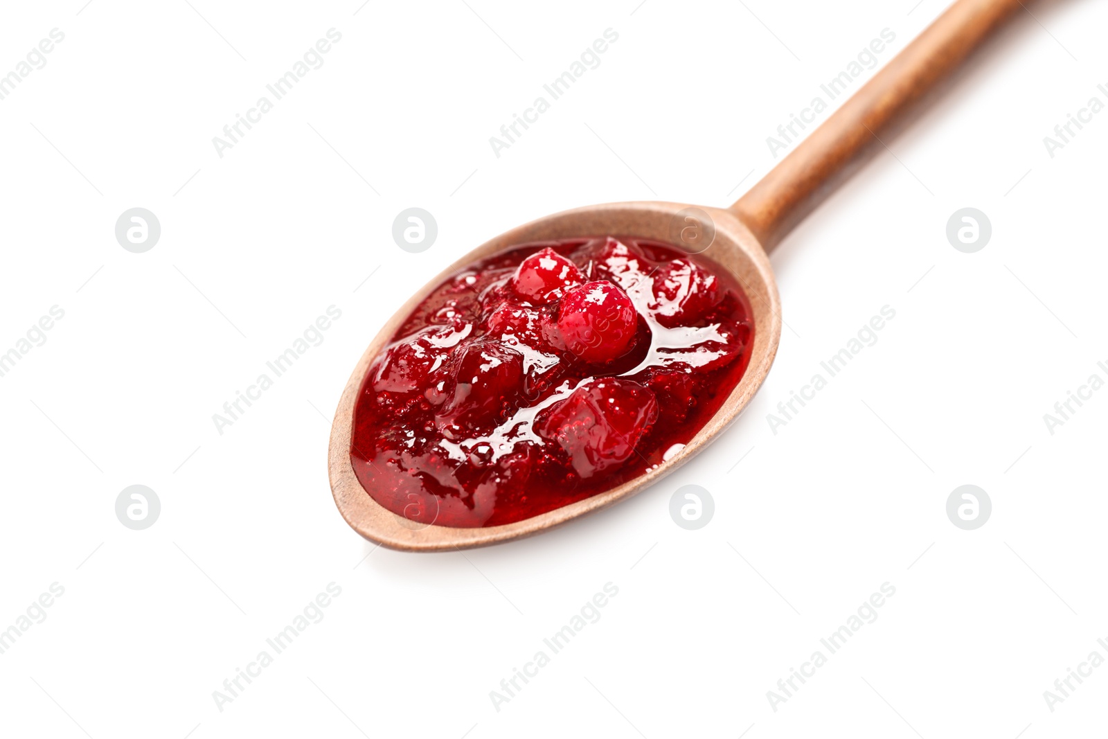 Photo of Wooden spoon with cranberry sauce isolated on white