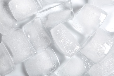 Ice cubes on white background, top view