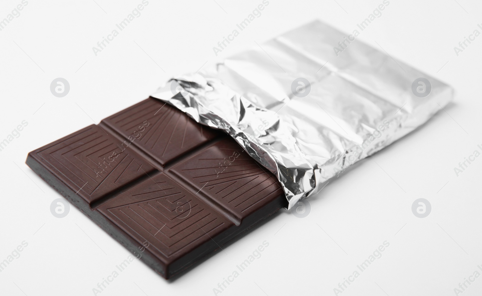 Photo of One tasty chocolate bar on white background