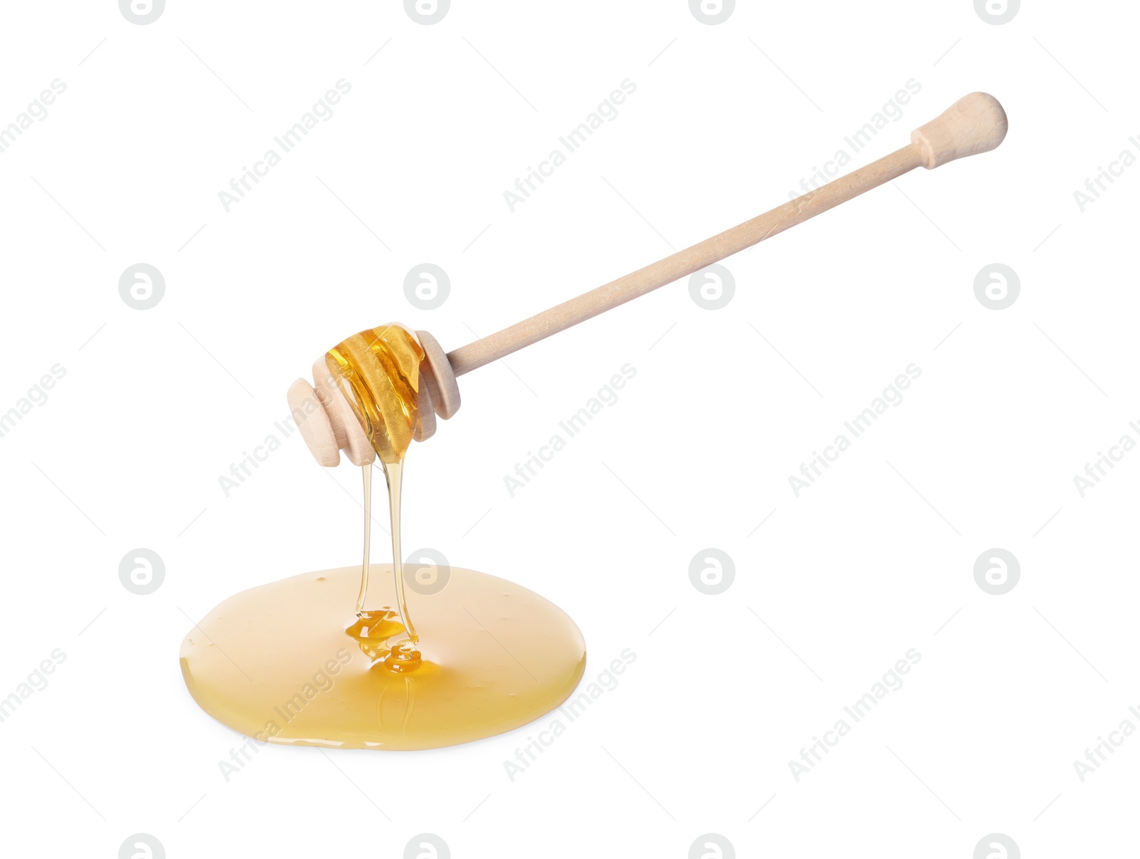 Photo of Fresh honey dripping from dipper on white background