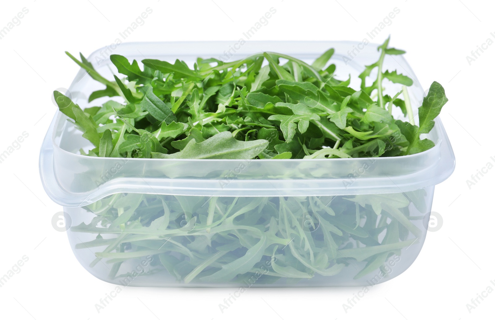 Photo of Fresh arugula in plastic container isolated on white