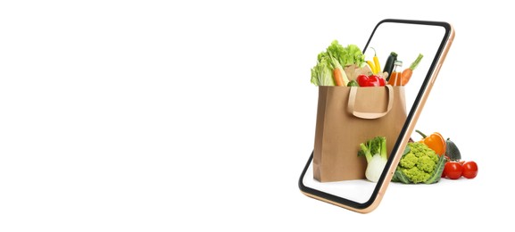 Image of Online shopping. Paper bag with food products in smartphone on white background