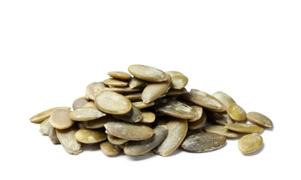 Photo of Pile of raw pumpkin seeds on white background