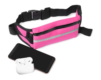 Photo of Stylish pink waist bag with smartphone and earphones on white background