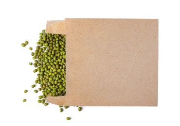 Raw mung beans with paper bag isolated on white, top view