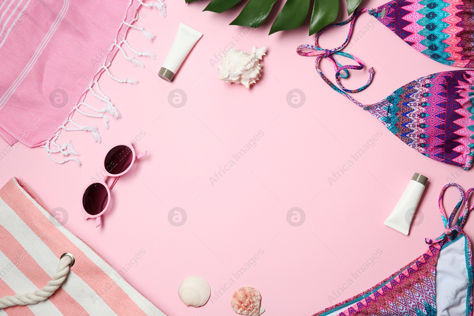 Photo of Flat lay composition with stylish bikini on color background. Space for text