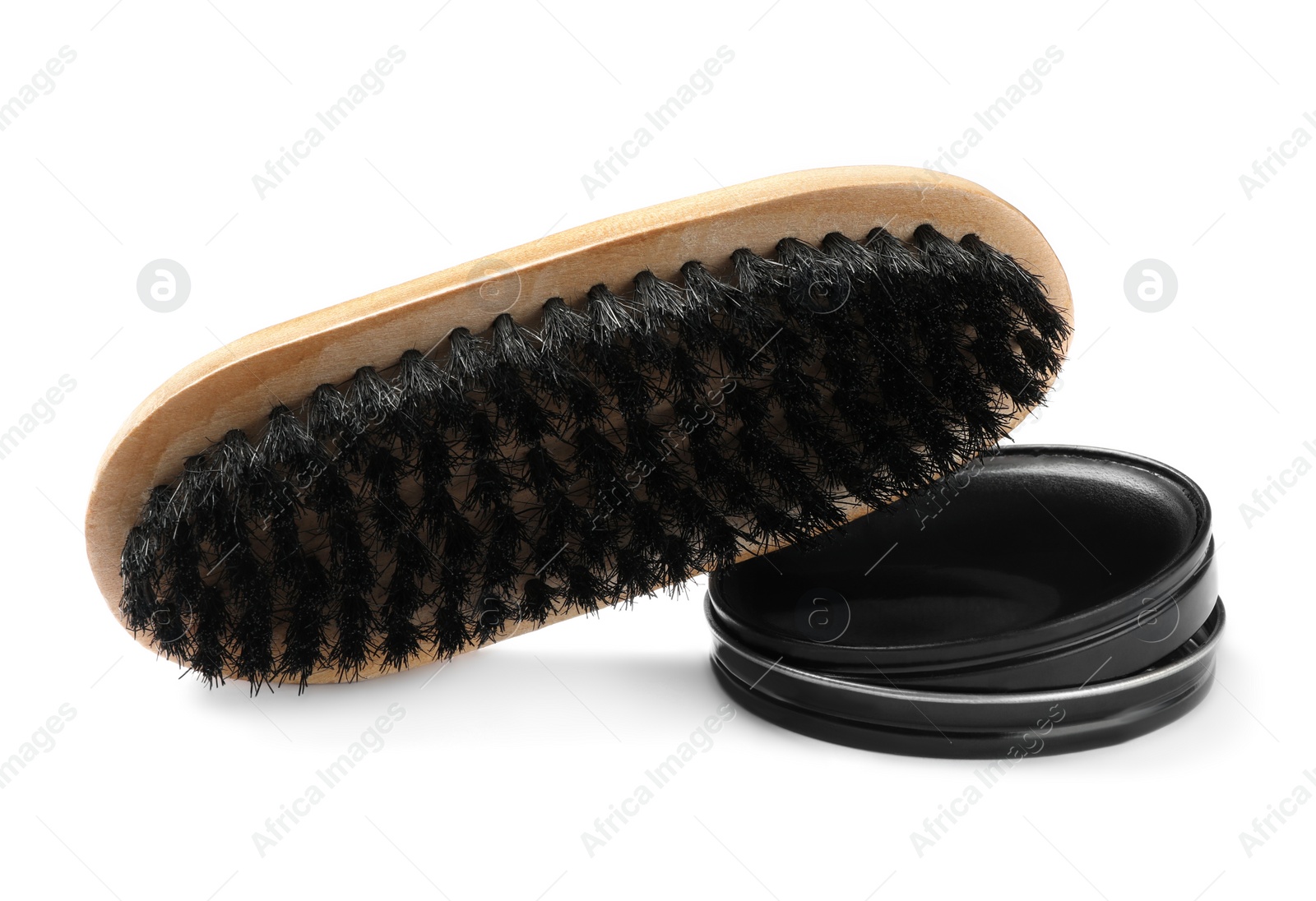 Photo of Polish with brush on white background. Shoe care accessories