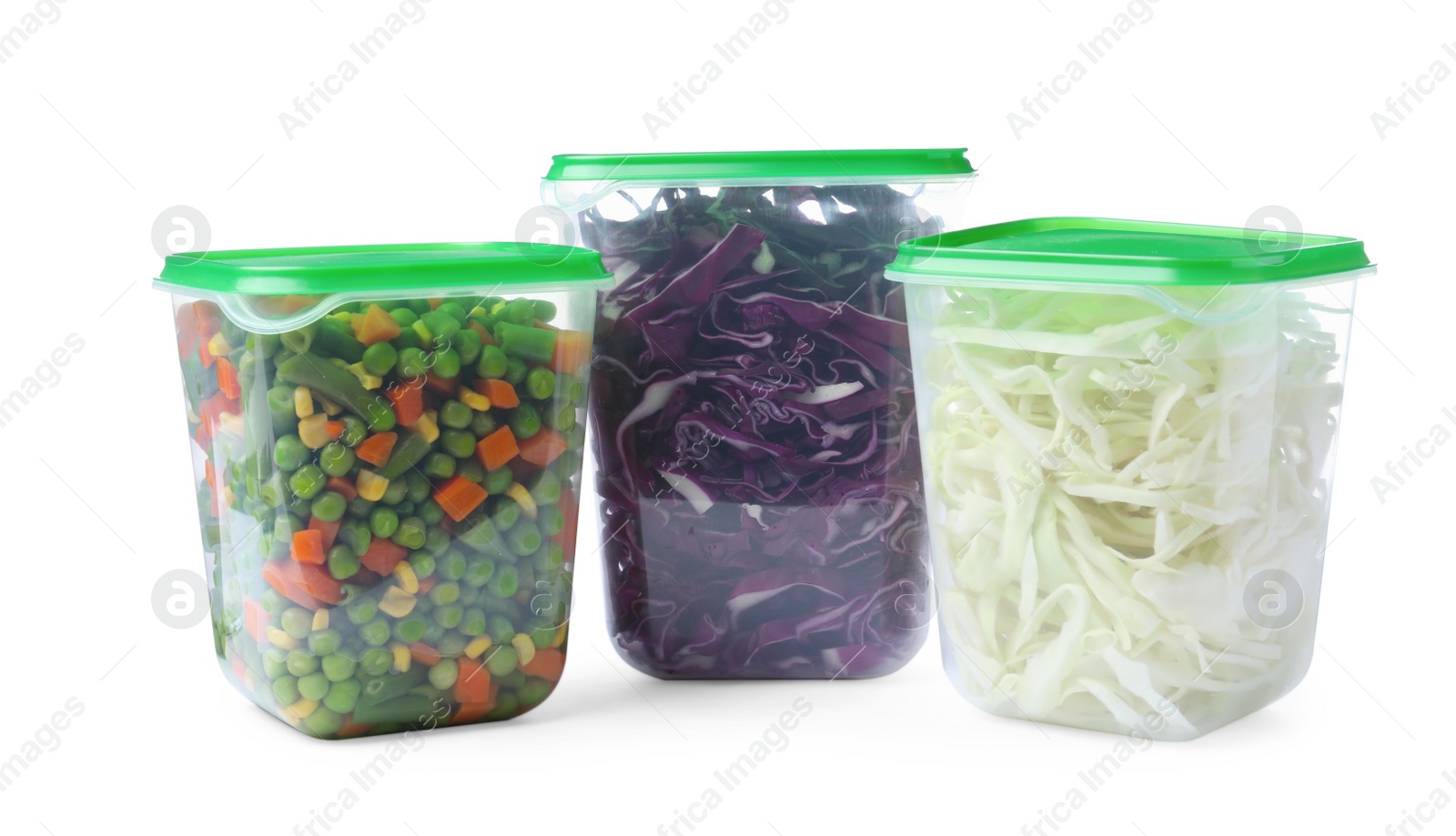 Photo of Fresh vegetables in plastic containers on white background