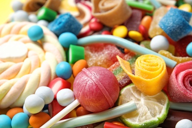 Many different yummy candies as background, closeup