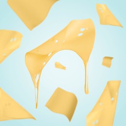 Image of Slicescheese falling on light blue background
