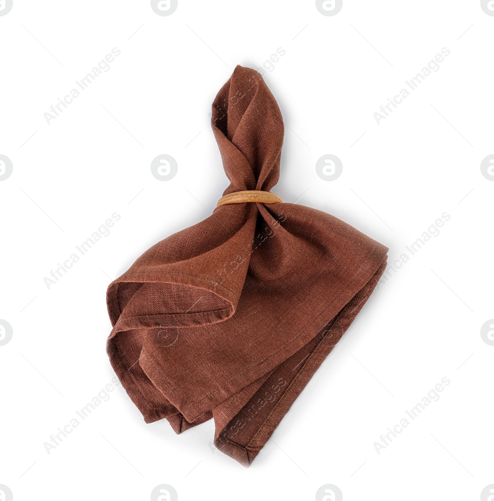 Photo of Fabric napkin with decorative ring for table setting on white background