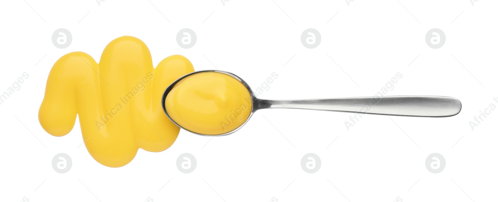 Photo of Delicious cheese sauce and spoon isolated on white, top view