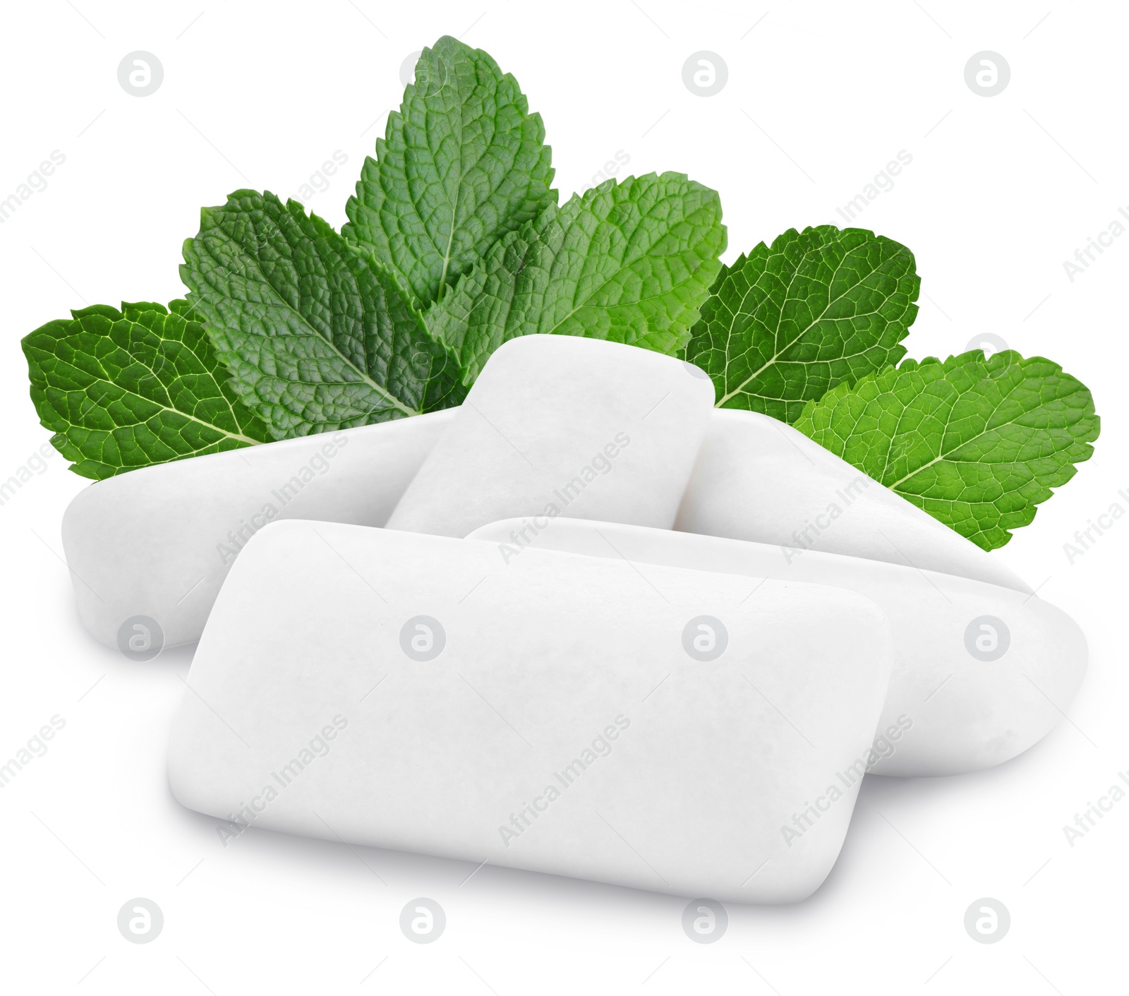 Image of Menthol chewing gum pillows and mint leaves on white background