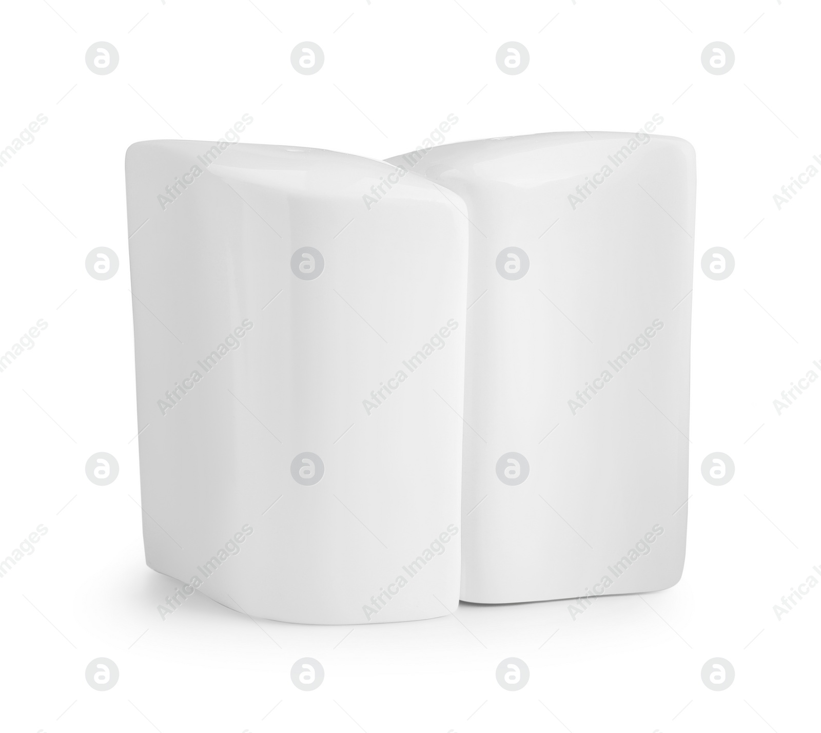 Photo of Salt and pepper shakers isolated on white