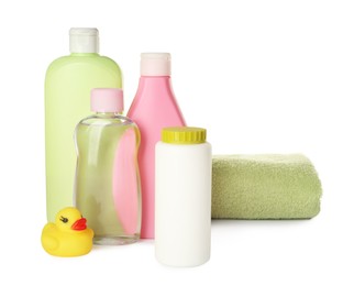 Photo of Set of baby cosmetic products towel and rubber duck on white background