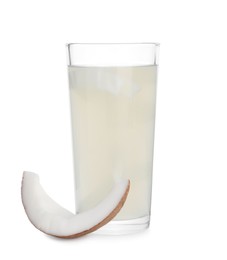 Photo of Glass of coconut water and nut isolated on white