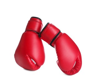 Photo of Pair of boxing gloves on white background. Sports equipment