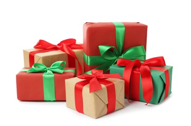 Photo of Different beautifully wrapped gift boxes on white background