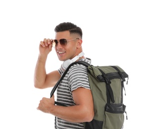 Photo of Man with backpack and headphones on white background. Summer travel