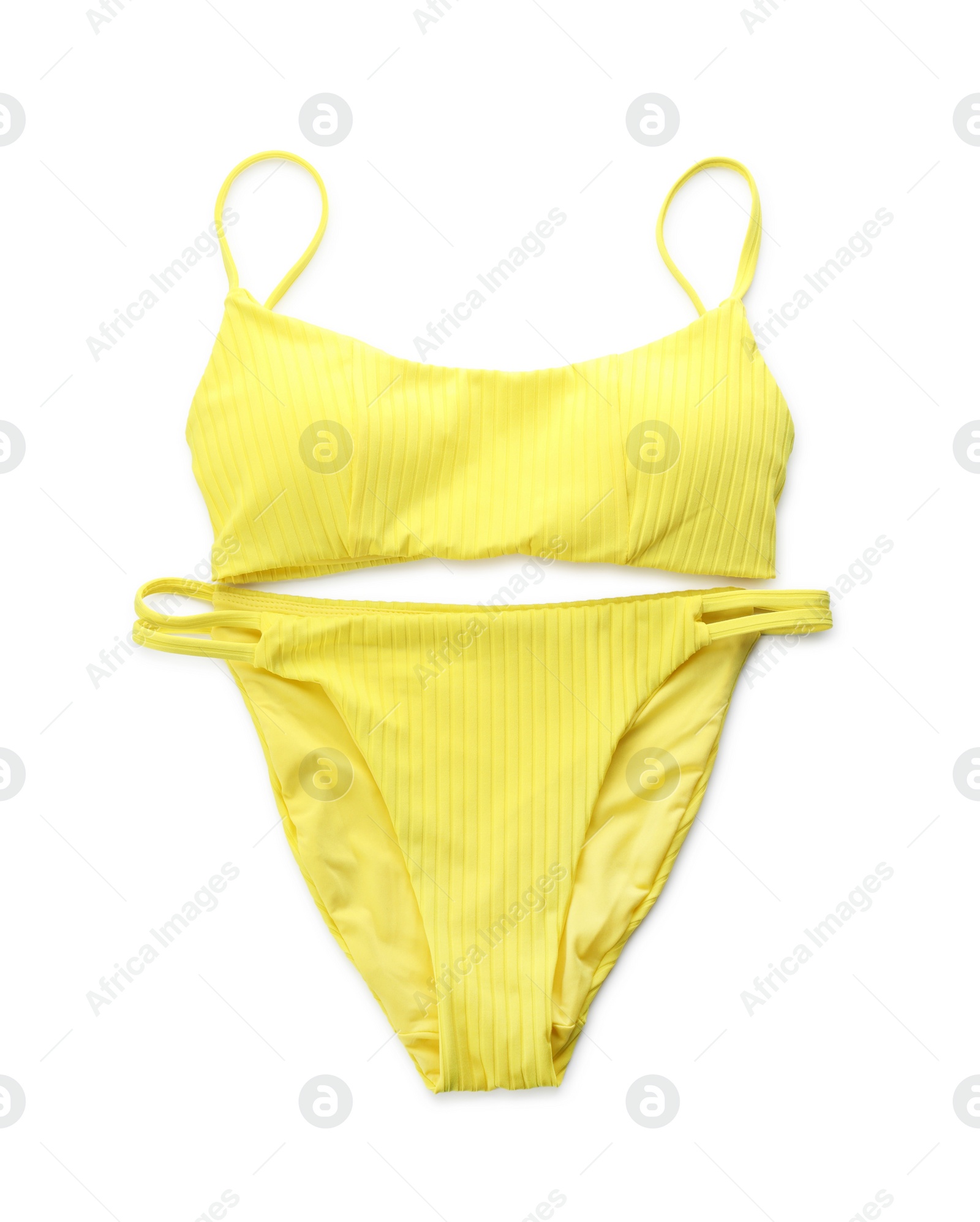 Photo of Stylish yellow swimsuit isolated on white, top view. Beach accessory