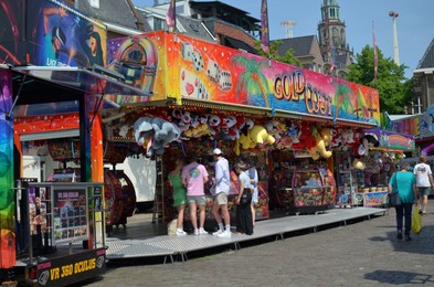 Photo of Netherlands, Groningen - May 18, 2022: Beautiful stall with many different toys in amusement park