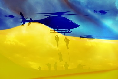 Image of Soldiers landing from helicopter on battlefield and Ukrainian national flag, double exposure
