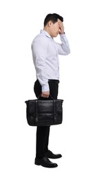 Photo of Tired businessman with briefcase posing on white background