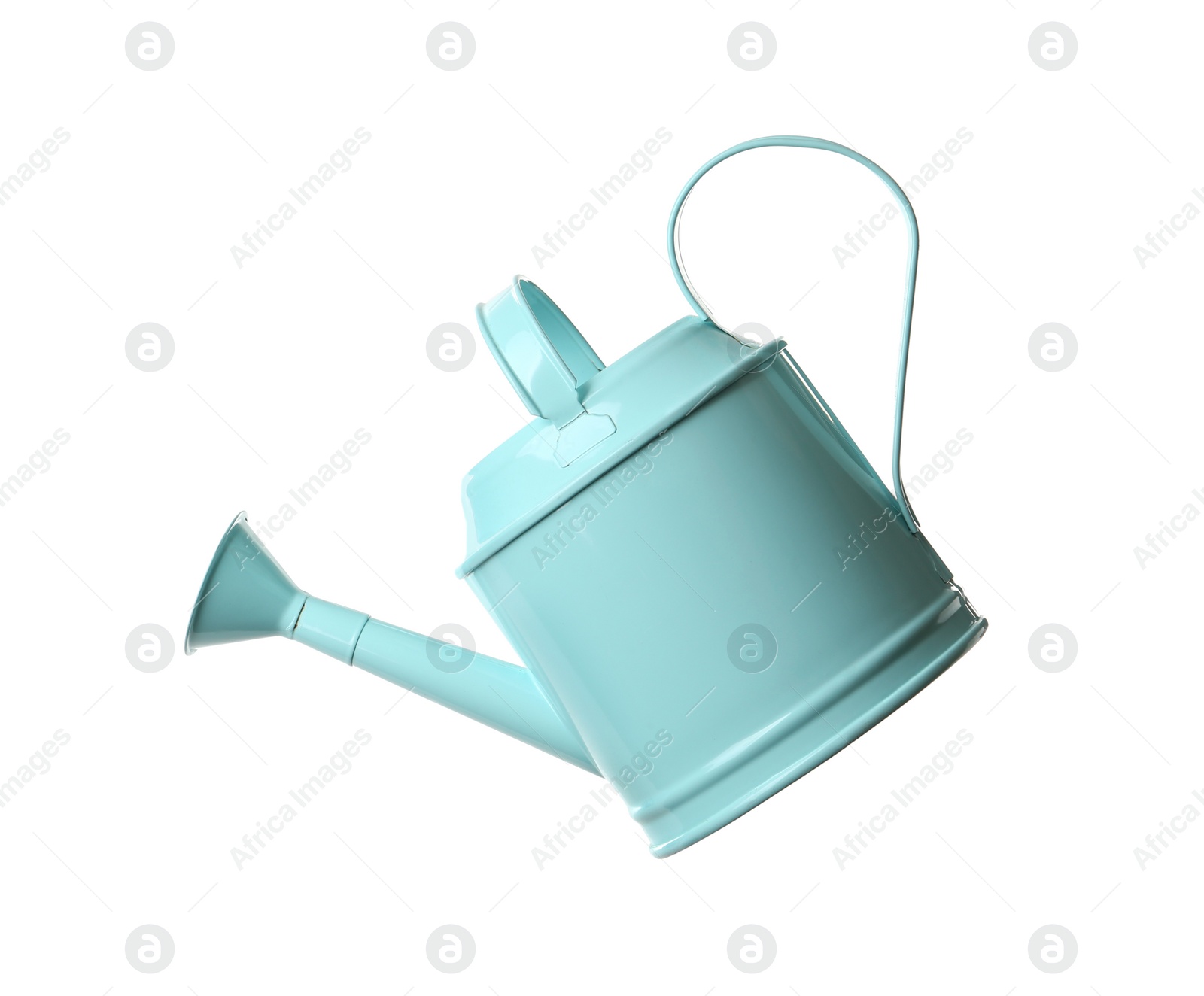 Photo of Turquoise metal watering can isolated on white