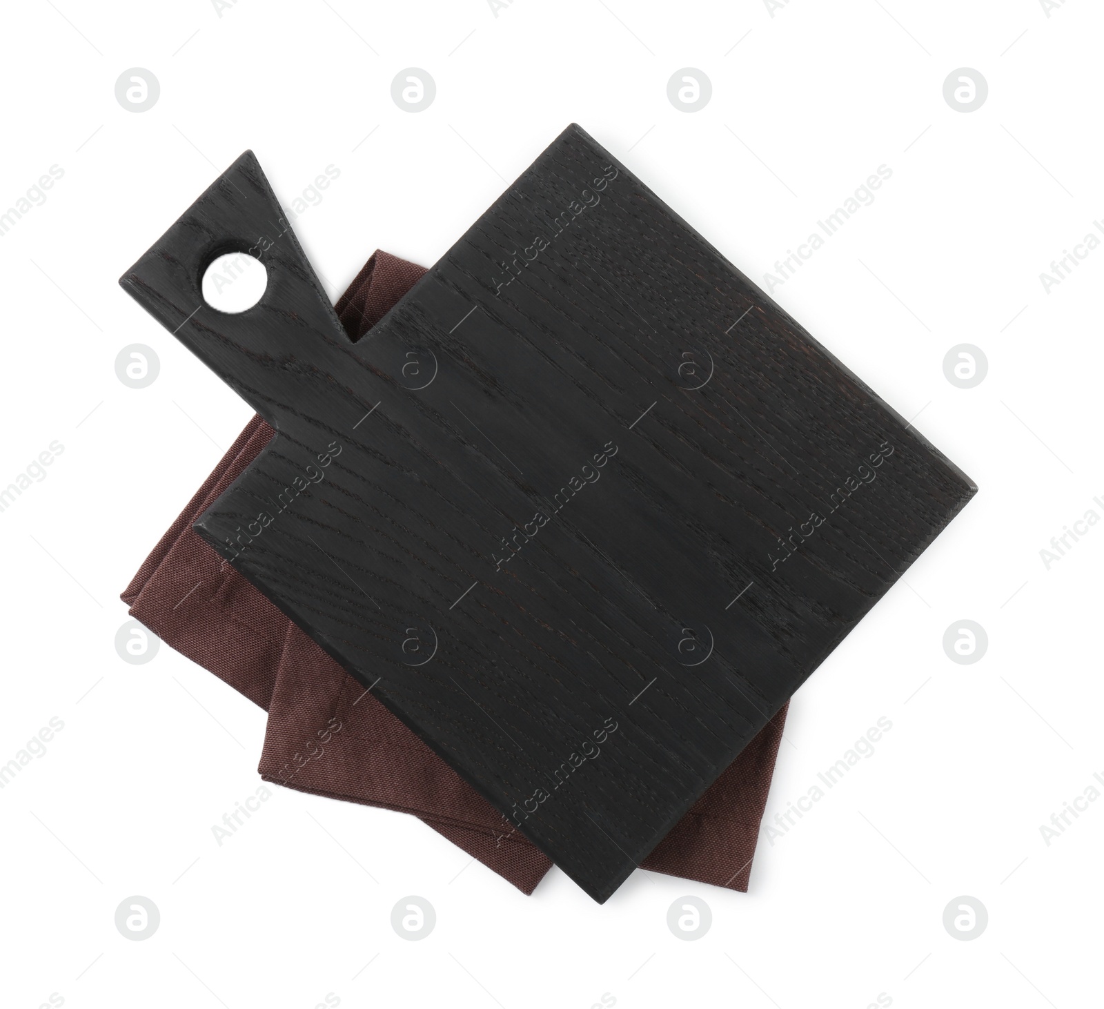 Photo of Black wooden cutting board and napkin isolated on white, top view