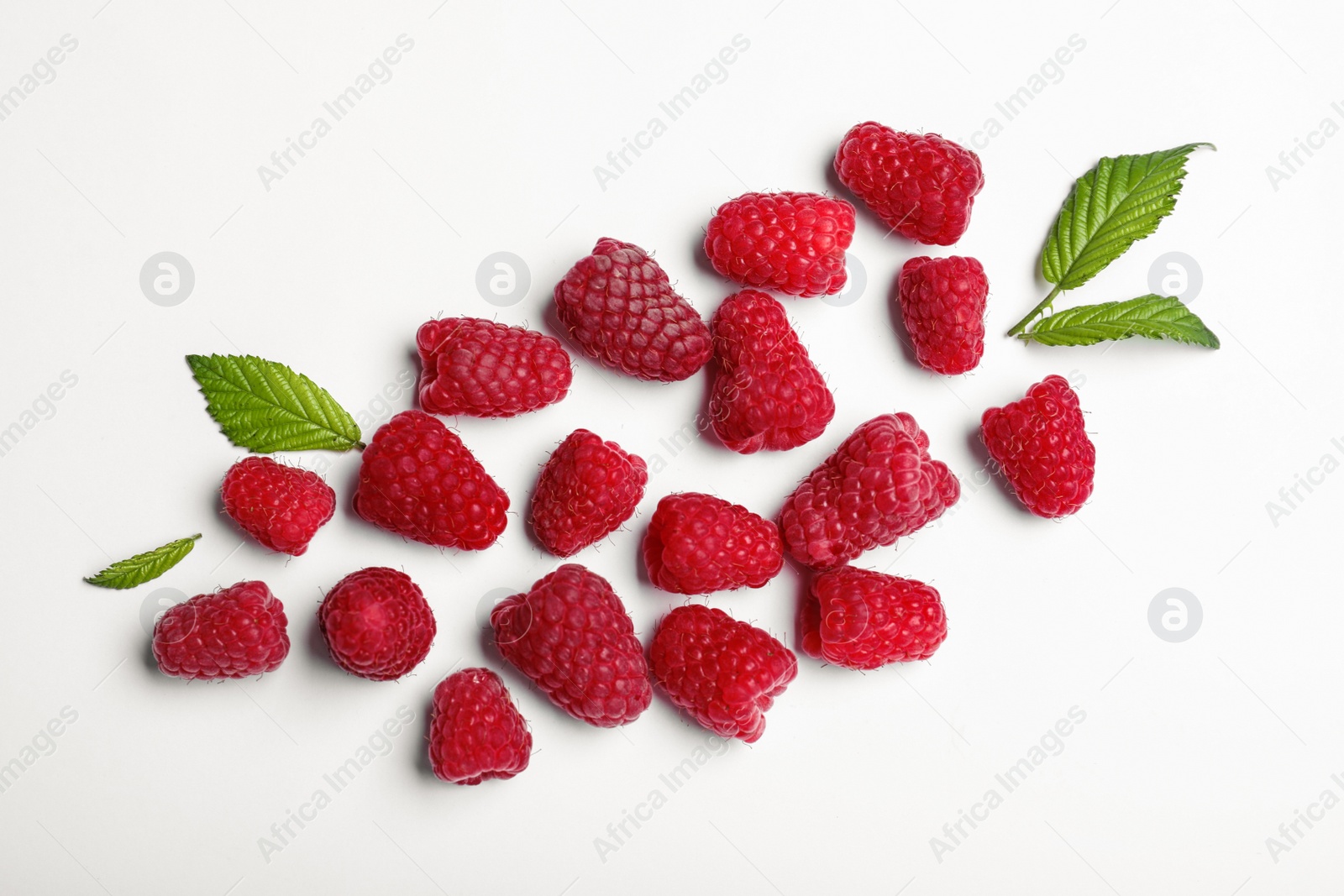 Photo of Composition with delicious ripe raspberries on white background, top view