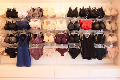 Many different beautiful women's underwear in lingerie store