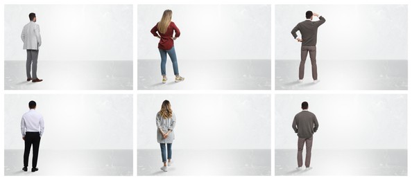 People standing in front of light marble walls, set with photos