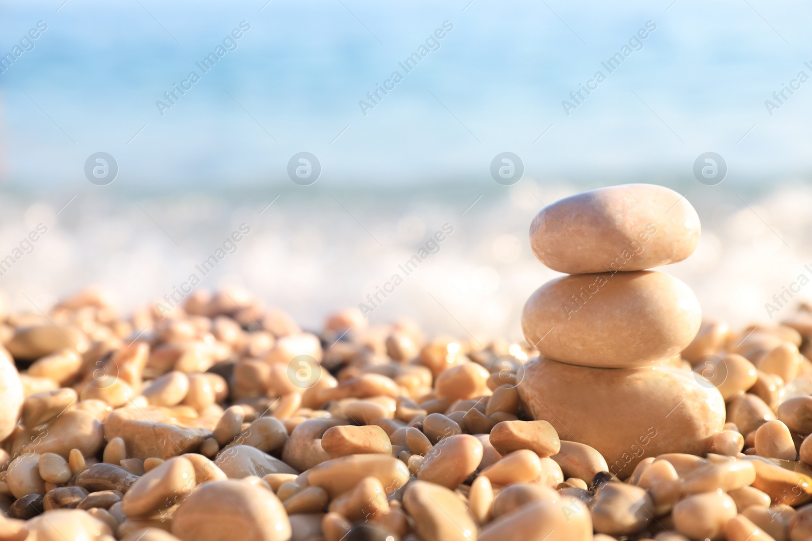 Photo of Stack of stones on beautiful pebble beach