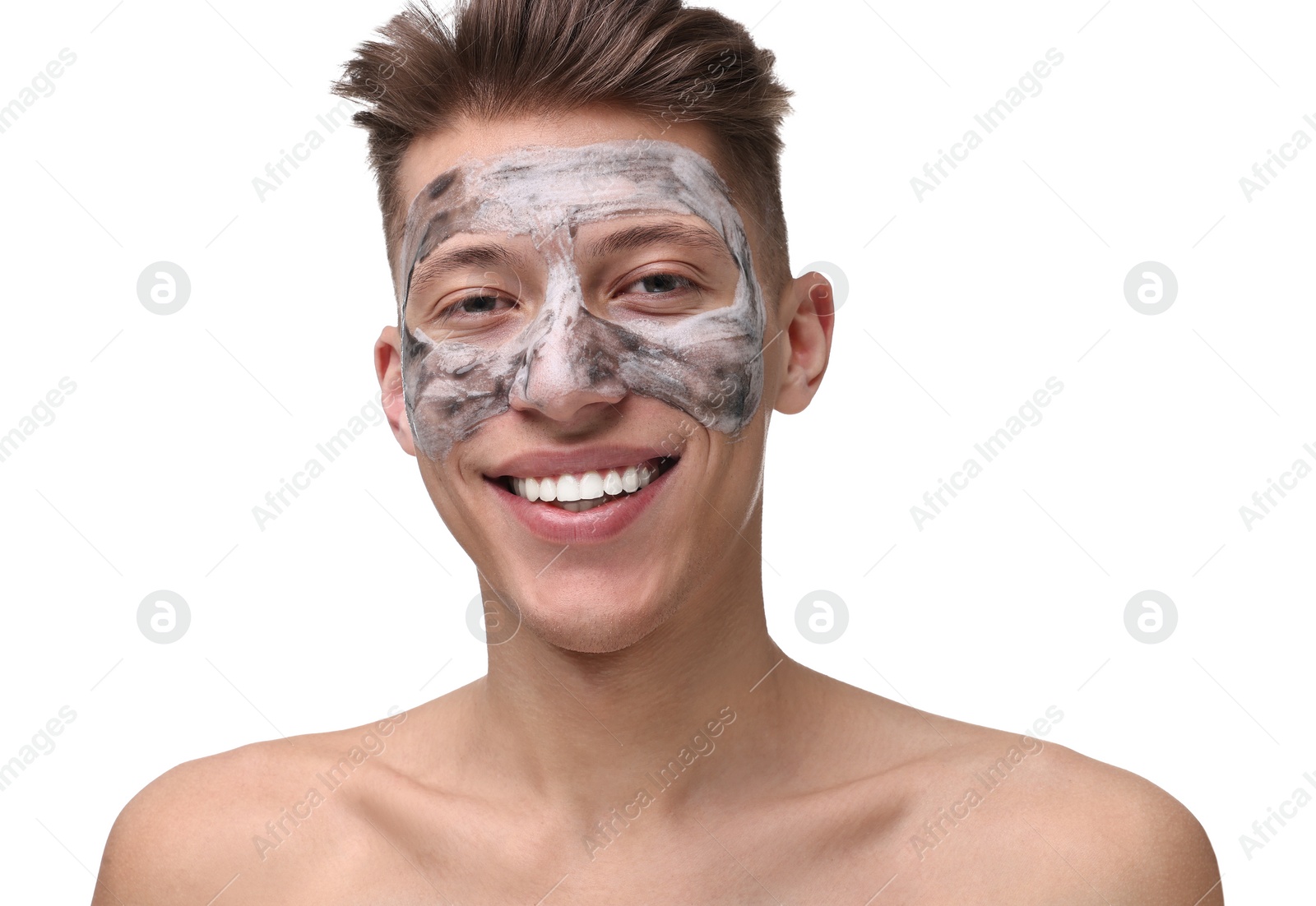 Photo of Handsome man with clay mask on his face against white background