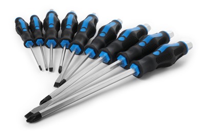 Photo of Set of screwdrivers with blue handles isolated on white