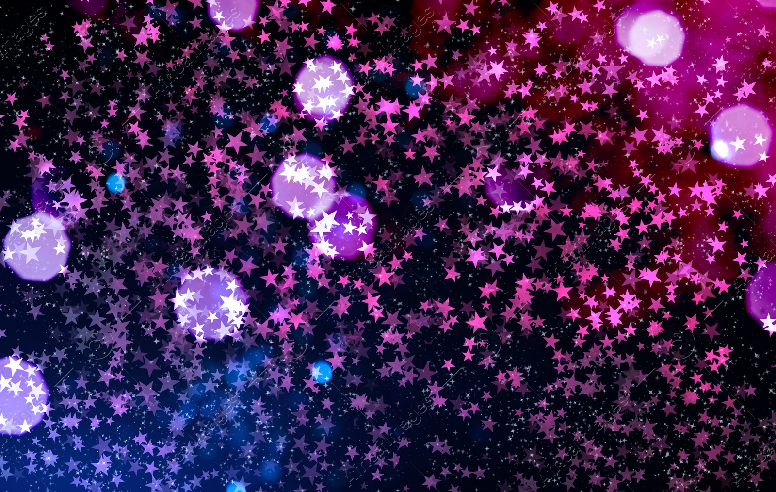 Image of Festive background with many beautiful shimmering stars and blurred lights. Bokeh effect