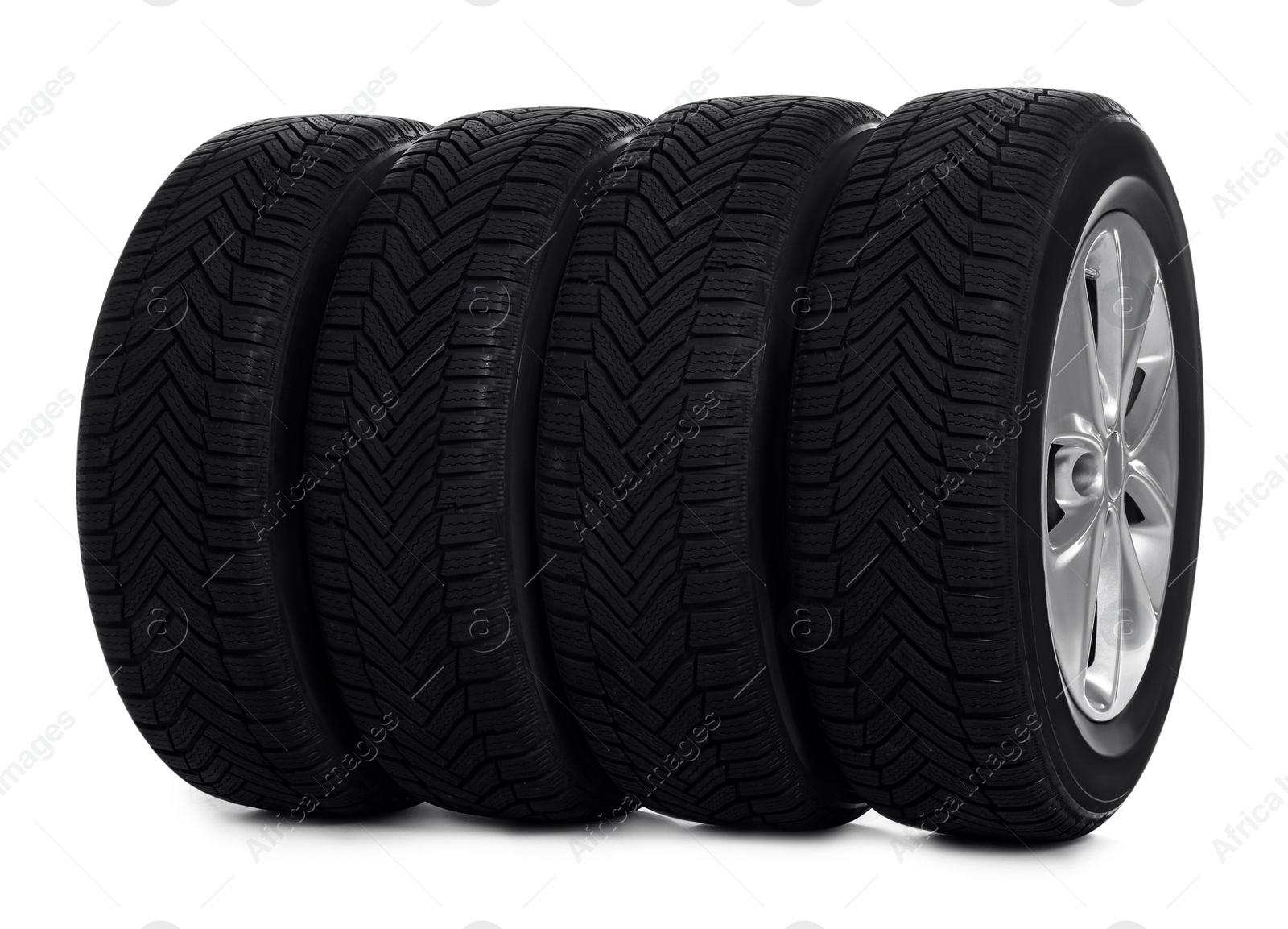 Photo of Set of wheels with winter tires on white background