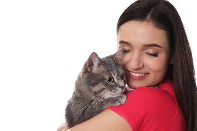 Photo of Young woman with cute cat on white background. Pet and owner