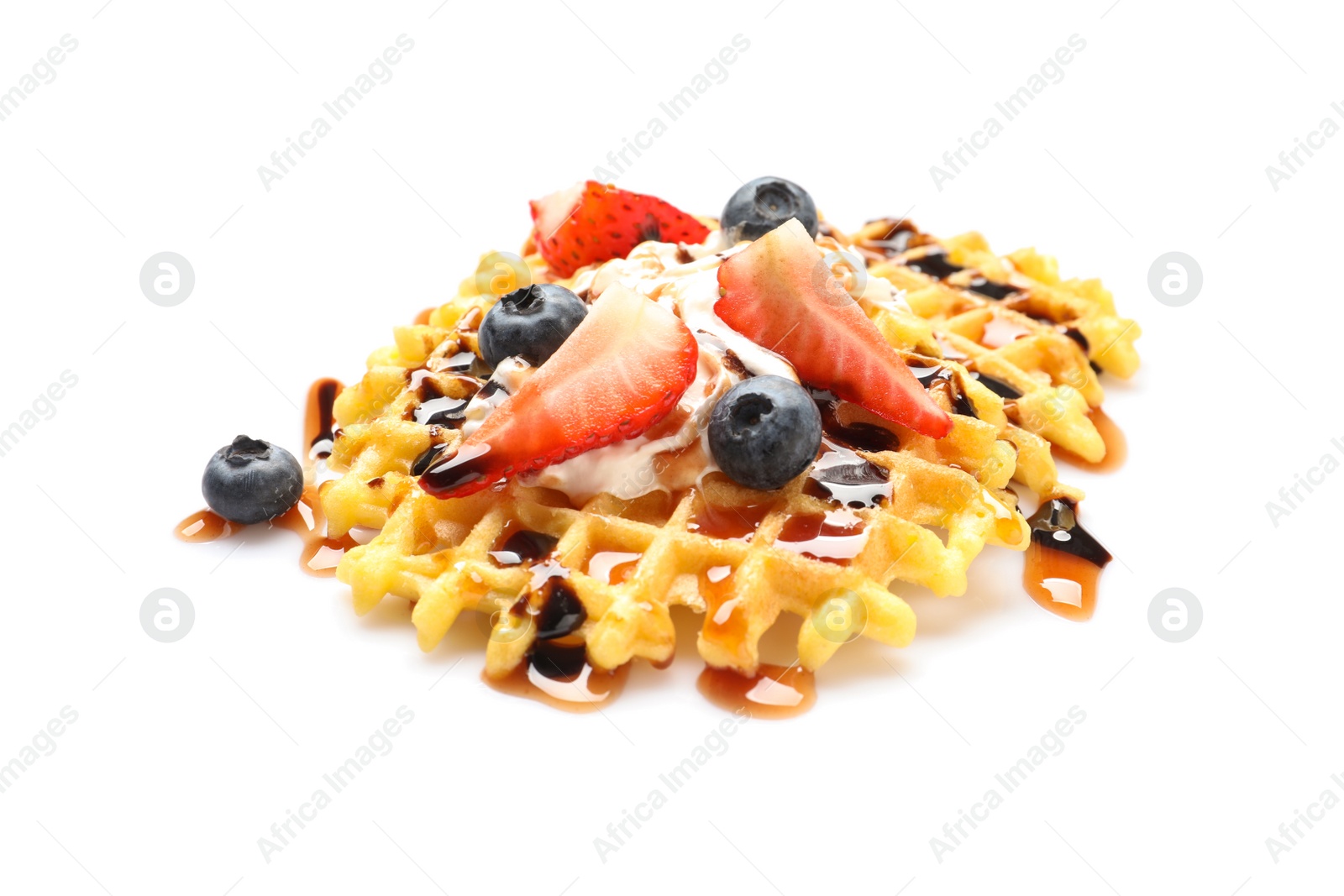 Photo of Delicious waffles with berries and whipped cream on white background