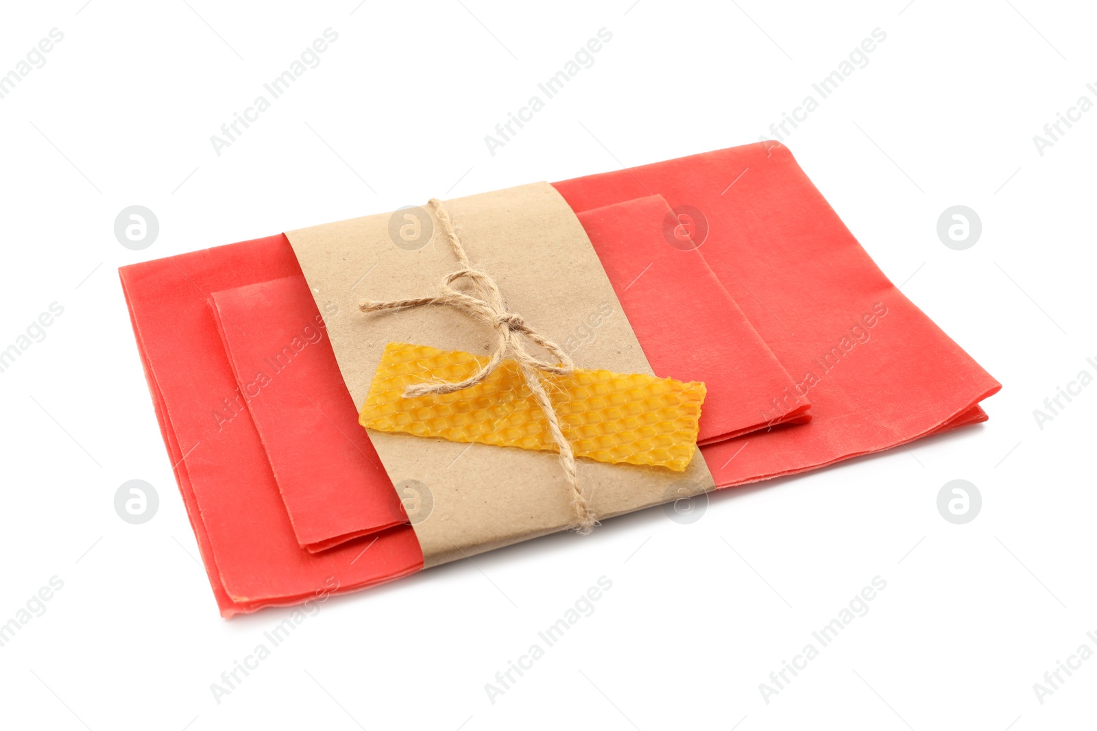 Photo of Reusable beeswax food wraps on white background