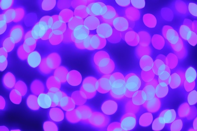 Photo of Beautiful glowing lights as background. Bokeh effect