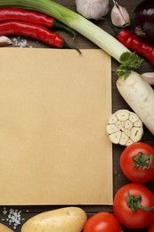 Blank recipe book and different ingredients on wooden table, flat lay. Space for text