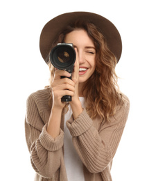 Photo of Beautiful young woman using vintage video camera on white background