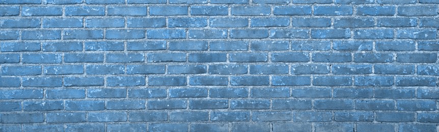 Texture of steel blue color brick wall as background, banner design