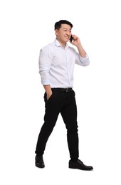 Photo of Businessman in formal clothes talking on phone against white background