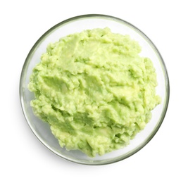 Photo of Glass bowl of tasty avocado sauce on white background, top view