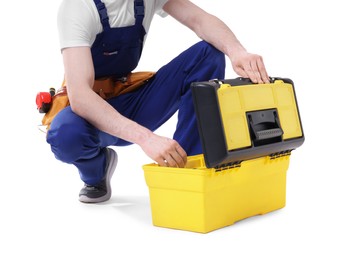 Professional repairman with tool box on white background