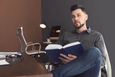 Male lawyer working in office